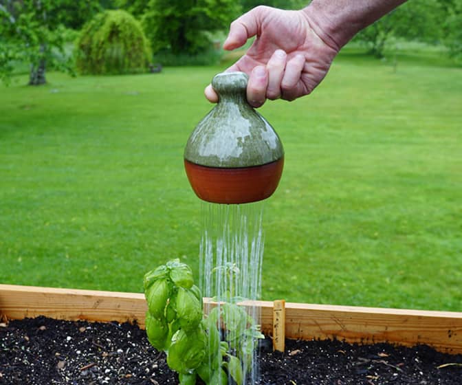 Thumb-Controlled Watering Can
