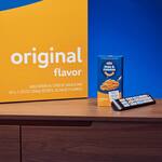 65 Boxes of Kraft Mac and Cheese in a 65-inch Flatscreen TV Box