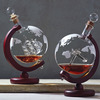 Antique Ship and Airplane in a Bottle Etched Globe Whiskey Decanter Set