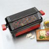 Brookstone Grill Tumbler - Roll Meat and Vegetables Across the Grill