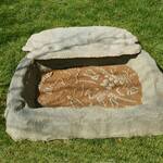 Discreet Landscaping Boulder Sandbox