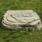 Discreet Landscaping Boulder Sandbox