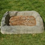 Discreet Landscaping Boulder Sandbox
