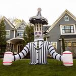 Gigantic Inflatable Beetlejuice with Rotating Carousel and Hammer Arms