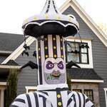 Gigantic Inflatable Beetlejuice with Rotating Carousel and Hammer Arms
