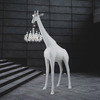 Life-Size Giraffe Statue Holding a Chandelier In Its Mouth