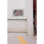 Man Trapped Behind a Wall Grate Graphic