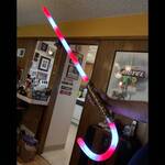 Santa Saber - Illuminated Double-Bladed Candy Cane Saber