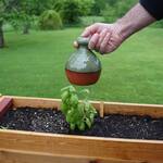 Thumb-Controlled Watering Can