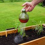 Thumb-Controlled Watering Can