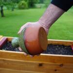 Thumb-Controlled Watering Can