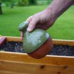 Thumb-Controlled Watering Can
