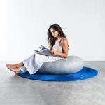 Zen Kusshion - Giant Stone Pillow on a Rippling Blue Rug