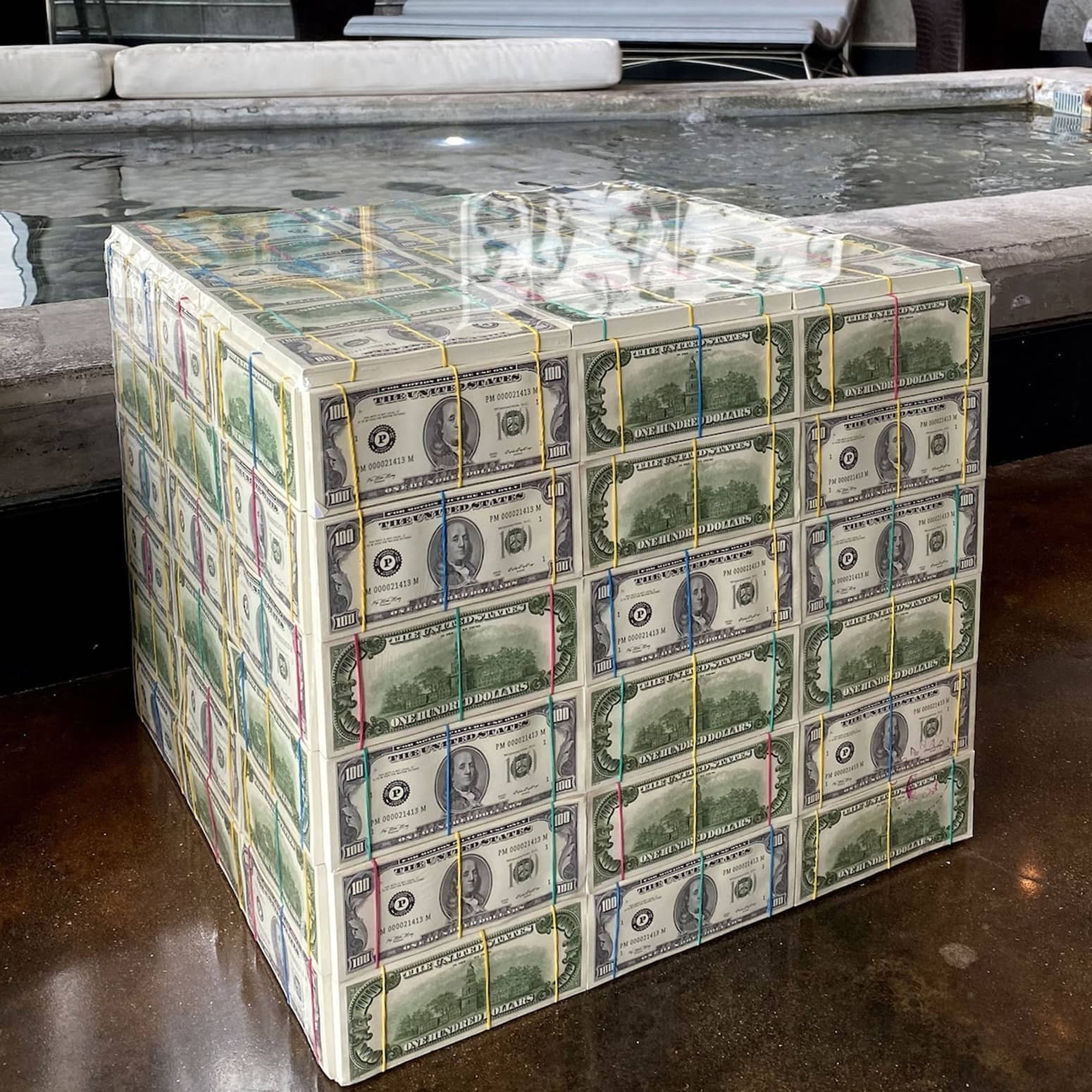 Shrink-Wrapped Million Dollar Money Cube Table