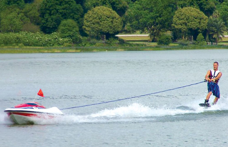 Water Skier Controlled Tow Boat